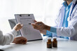 © crizzystudio - Doctors have conversations with patients while discussing and explaining symptoms or counseling diagnosis health and consult treatment of disease, healthcare, and assistance concept.