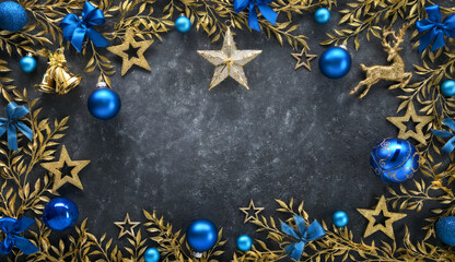 Sticker - Christmas background with elegant gold adornments as a frame, blue baubles and bows, on a dark gray textured board as copy space