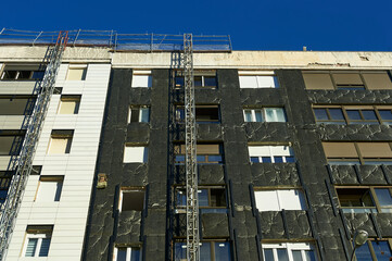 rehabilitation of facades to place insulation from cold and heat with new ceramic tiles