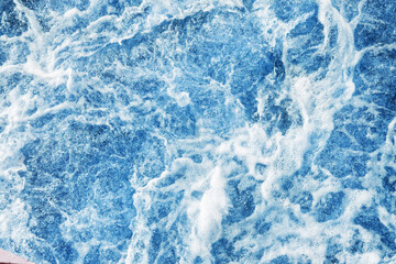 Wall Mural - Ocean wave background. Bubble water backdrop. Turbulent sea texture. Messy water flow. Depth of the sea. Water foam surface backdrop.