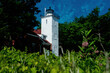 Digitally created watercolor painting of 40 Mile Point Lighthouse on the shore of Lake Huron Michigan