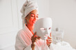 © milanmarkovic78 - Woman Getting A Led Light Facial Mask Treatment At The Beauty Salon