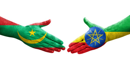 Handshake between Ethiopia and Mauritania flags painted on hands, isolated transparent image.