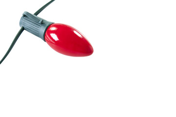 Wall Mural - isolated red c9 light bulb with a green base and wire