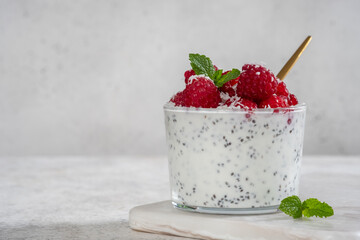 Wall Mural - Chia pudding with coconut milk and raspberry with mint