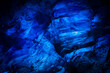 fluorite macro detail texture background. close-up raw unpolished blue semi-precious gemstone.