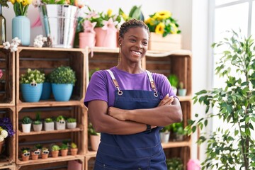 Canvas Print - African american woman florist smiling confident standing with arms crossed gesture at florist