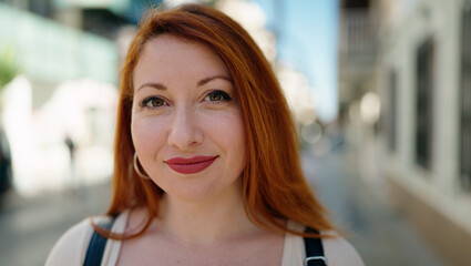 Sticker - Young redhead woman smiling confident standing at street