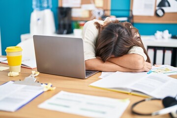 Sticker - Young beautiful hispanic woman business worker leaning on table sleeping at office