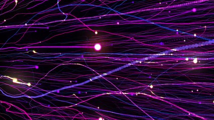 Bright multi-colored particles fill the space with jets of energy and light. Shiny colorful abstract background for bright festive decoration