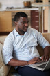 © DragonImages - Businessman Working on Laptop