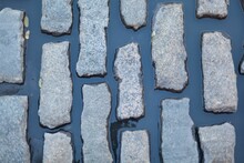 Close Up Of Wet Granite Setts