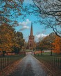 Beautiful display of the Aston Parish Church surrounded by autumn foliage, great for background