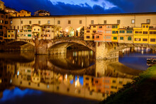 Ponte Vecchio bridge over Arno river at night, Florence, Italy