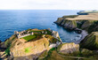 Aerial view Aberdeenshire, DUNNOTTAR CASTLE, SCOTLAND sunset, sea, rocks and cliffs made by drone, scenic panoramaold castle near Stonehaven