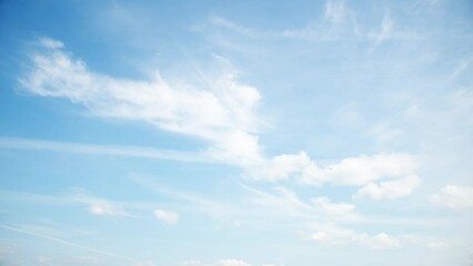 Wall Mural - Timelapse with blue sky with clouds. Clouds located in two layers at different heights move in different directions. Unusual celestial phenomenon.