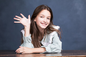 Wall Mural - Studio portrait of a young teen girl