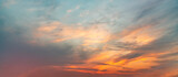 Fototapeta Zachód słońca - Beautiful sunset sky with clouds. Sunset sky background.