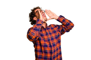 Wall Mural - Young caucasian curly hair man isolated Young caucasian man with curly hair isolated shouting excited to front.