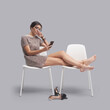 Woman sitting with feet up