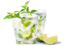 Cold Mojito Drink, Glass Of Alcohol Isolated Over White Background, Fresh Mint And Lime Fruit Slice, Food Still Life, Party And Holidays Celebration