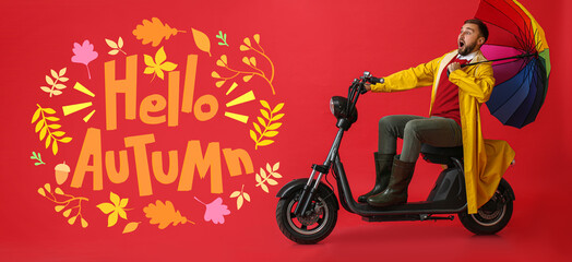 Canvas Print - Surprised man in raincoat and with umbrella riding bike on red background. Hello, autumn