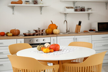 Sticker - Halloween pumpkins on dining table in light kitchen