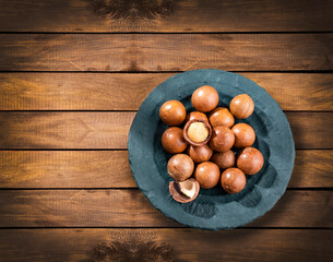 Wall Mural - Macadamia integrifolia - Organic macadamia nuts in the bowl