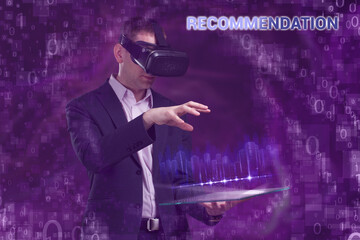 Wall Mural - Business, Technology, Internet and network concept. Young businessman working on a virtual screen of the future and sees the inscription: Recommendation