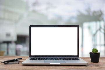 Wall Mural - Desk Laptop with blank screen on table  blur background with bokeh background that is used for editing