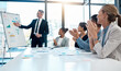 © Anela R/peopleimages.com - Meeting, presentation and applause with a business man training his team during a boardroom workshop. Leadership, education and strategy with a CEO, manager or leader coaching his employee staff