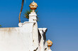 pediment and earthenware balls on a restored house in Olhao, Algarve, Portugal