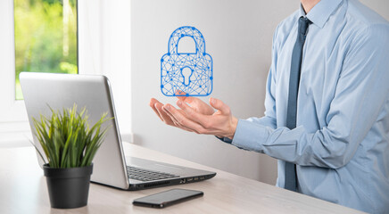 Wall Mural - Male hand holding a lock padlock icon.Cyber security network. Internet technology networking.Protecting data personal information on tablet. Data protection privacy concept. GDPR. EU.Banner