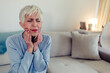 © Jelena Stanojkovic - Tooth pain. Woman feeling tooth pain. Closeup of beautiful sad women suffering from strong tooth pain. Attractive mature female feeling painful toothache. Dental health and care concept.