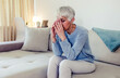 © Jelena Stanojkovic - Head shot close up portrait thoughtful middle aged retired woman worrying about personal health problems. Upset older female retiree thinking of family troubles, feeling lonely, sitting at home.