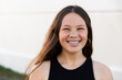 © Austockphoto - smiling mixed race teen