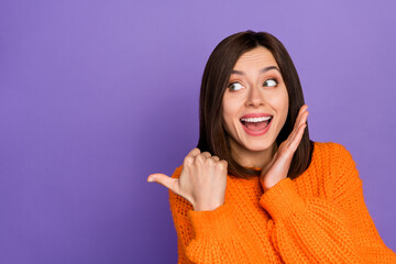 Sticker - Photo of impressed positive lady open mouth look direct thumb finger empty space isolated on violet color background