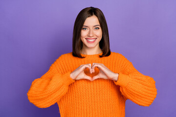 Wall Mural - photo of cute lovely girl hands fingers showing heart gesture isolated on violet color background
