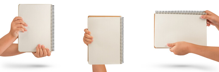 Wall Mural - Empty notepad in hand. A hand holds a blank notepad with copy space, isolated on a white background.