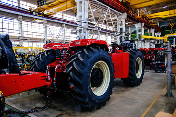 Wall Mural - Assembly process of agricultural tractors in industrial workshop