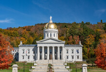 Gold Leaf Dome Of The Vermont State House Capitol Building In Montpelier, Vermont. Brilliant Fall Colors Surround The Building