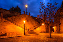 Lighten Stairs To The Prague's Charles Bridge From Kampa Park In The Morning Blue Hour In Autumn.