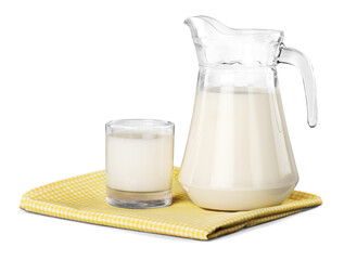 Canvas Print - A glass of milk and a milk jug on plaid tablecloth