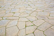 Typical traditional urban italian stone paving made with Opus Incertum irregular stone blocks
