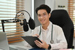 © saltdium - Health radio program or online podcast by an Asian male Doctor, social media and trends concept.
