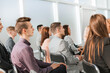 © yurolaitsalbert - group of young business people sitting in the conference room