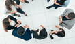 © yurolaitsalbert - top view. group of corporate employees standing in a circle.