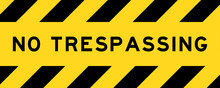 Yellow And Black Color With Line Striped Label Banner With Word No Trespassing