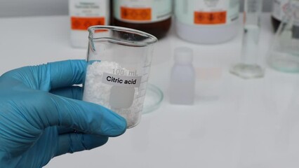 Poster - Citric acid in glass, chemical in the laboratory and industry, Chemicals used in the analysis