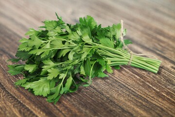 Wall Mural - Parsley green fresh bunch on the desk